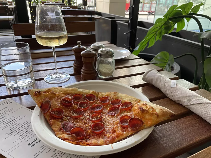 Poco Fiasco pizza slice