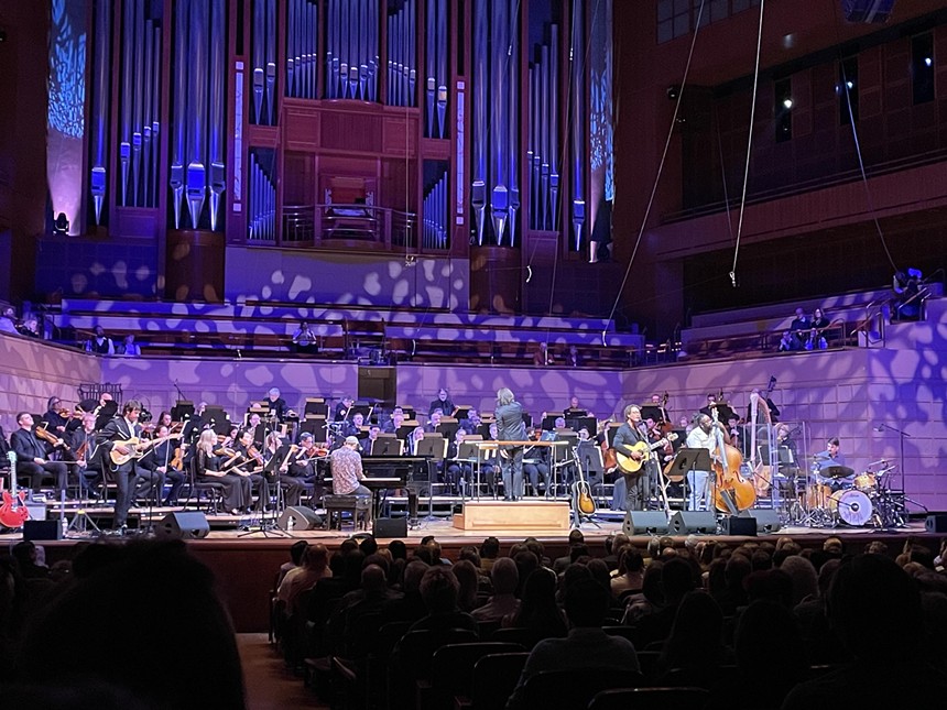 Amos Lee performing with the Dallas Symphony Orchestra