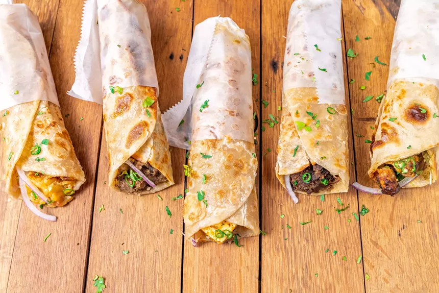 Aloo masala, shami kabab, achari paneer and chicken tikka kati rolls at Kati Roll Compnay