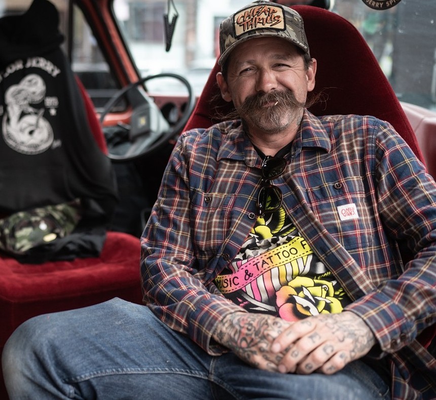 Oliver Peck, pictured at the Elm St. Music and Tattoo Festival in May 2019, is a huge name in the tattoo world.