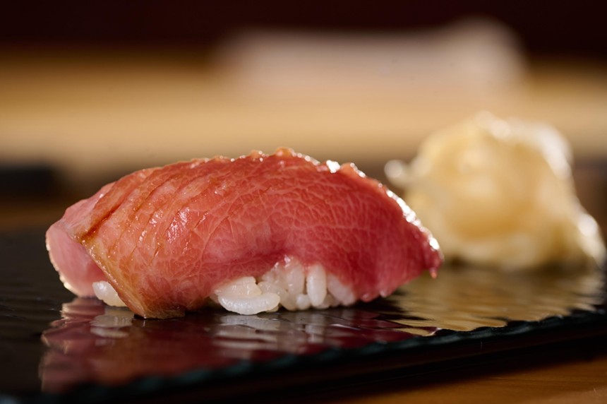 a cut of toro sushi