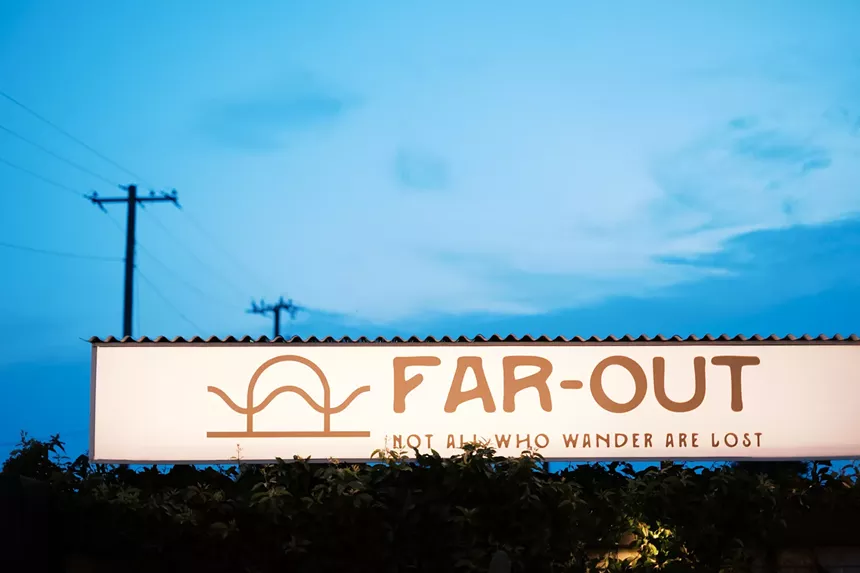 A restaurant sign close up
