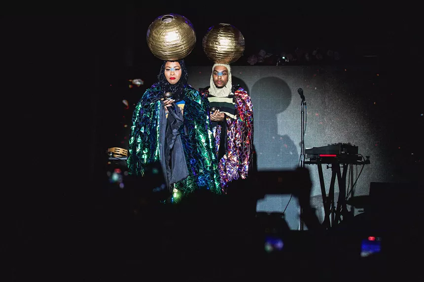 Two women performing on stage