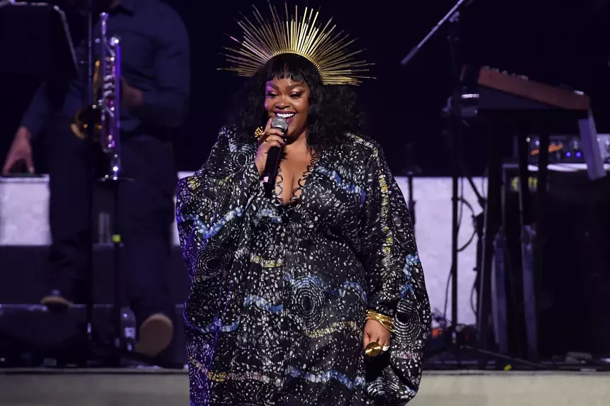 Woman singing on stage