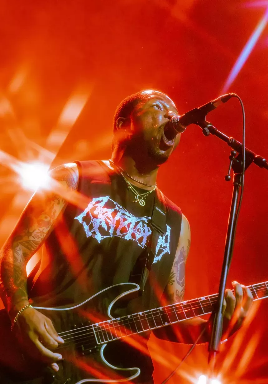 Metal band playing on stage