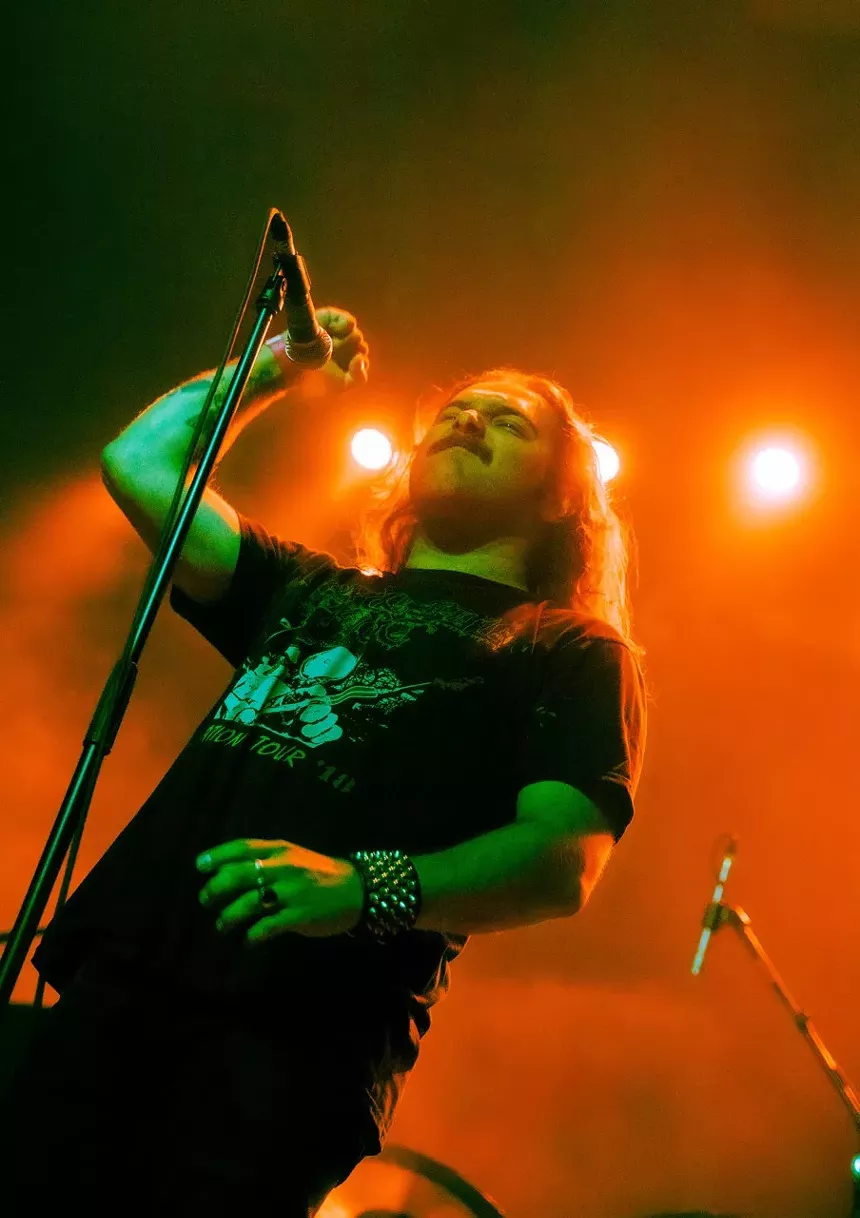 Metal band playing on stage