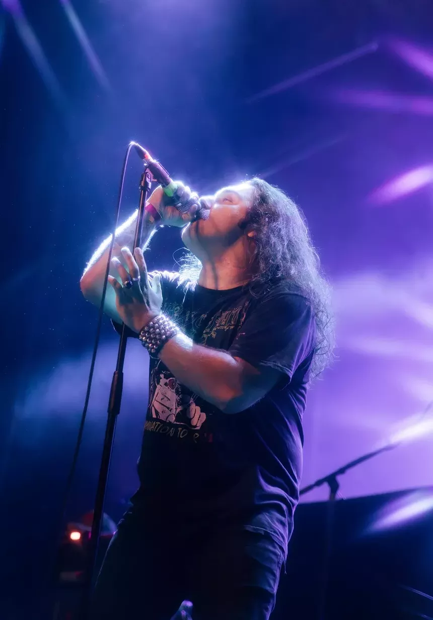 Metal band playing on stage