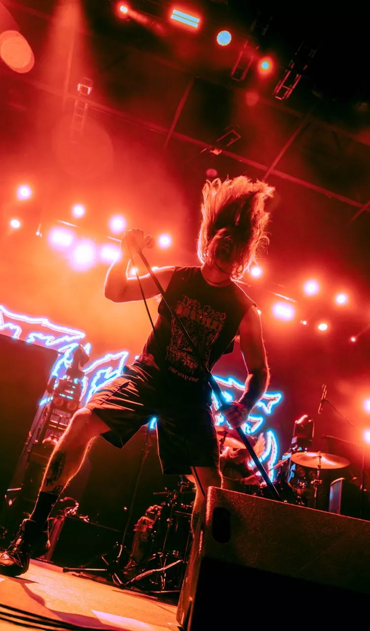 Metal band playing on stage