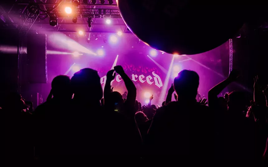 Metal band playing on stage