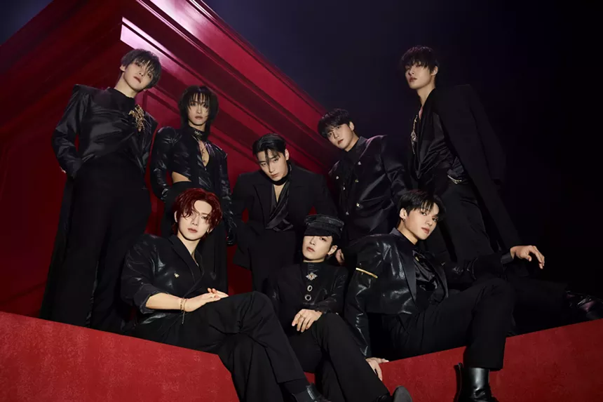 A photo of their K-pop band members posing
