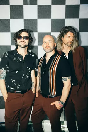 Band posing for a picture