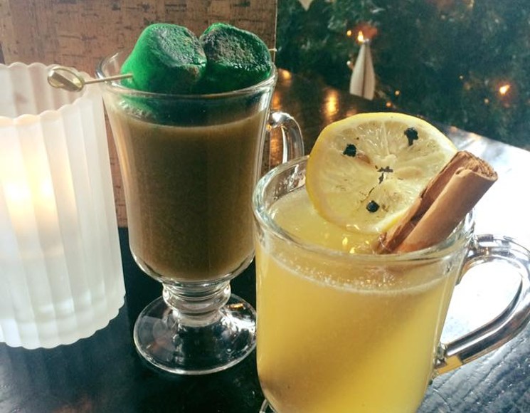 The Puffy Brew-Stir (drink in background) brings unexpected bedfellows together to make a more unexpected and oddly colored drink with Fernet Branca, Fernet Menta, Godiva liqueur, coffee, and a Green Chartreuse marshmallow. - COURTESY OF THE LIBERTINE BAR