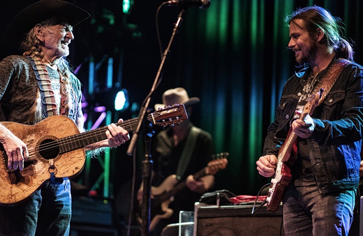 Willie Nelson's show at the Granada Tuesday was truly a family affair. He's shown here playing with his son Lukas, who is a successful musician in his own right. - MIKE BROOKS