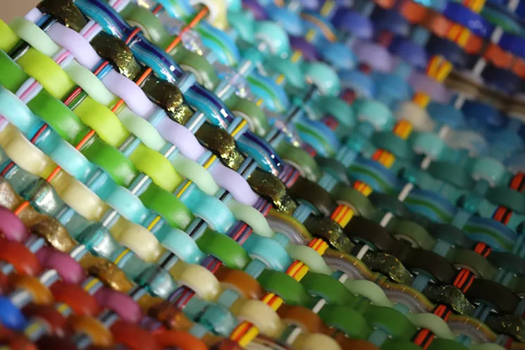 Before art collector and interior designer Margie Weidenbaker died last year, she gifted her three children a woven glass piece. - DIAMOND VICTORIA