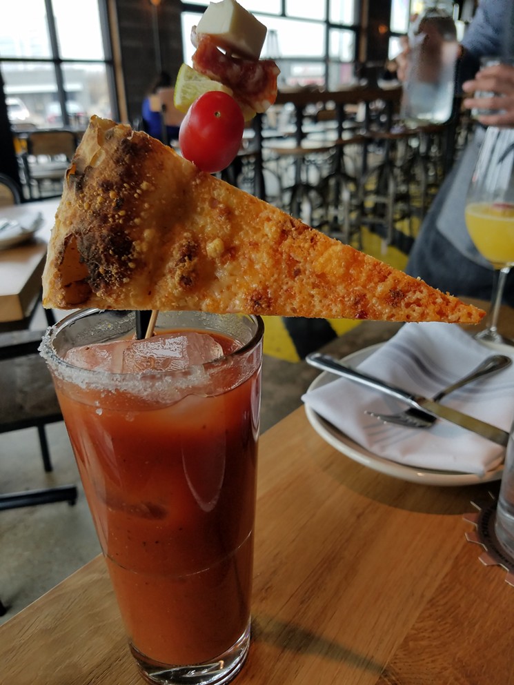 This bloody mary's cheesy bread flag alerts drinkers to the reduced executive functioning that awaits them at the bottom of the glass. - KATHRYN DEBRULER
