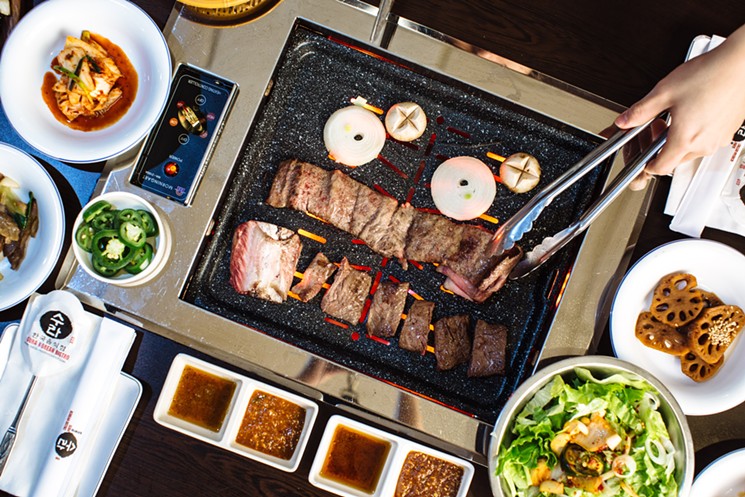 You can go fill up on grill-it-yourself-meat at Sura's meat buffet, but the Korean restaurant issues a $10 fee (donated to UNICEF) for taking more meat than you can eat. - KATHY TRAN