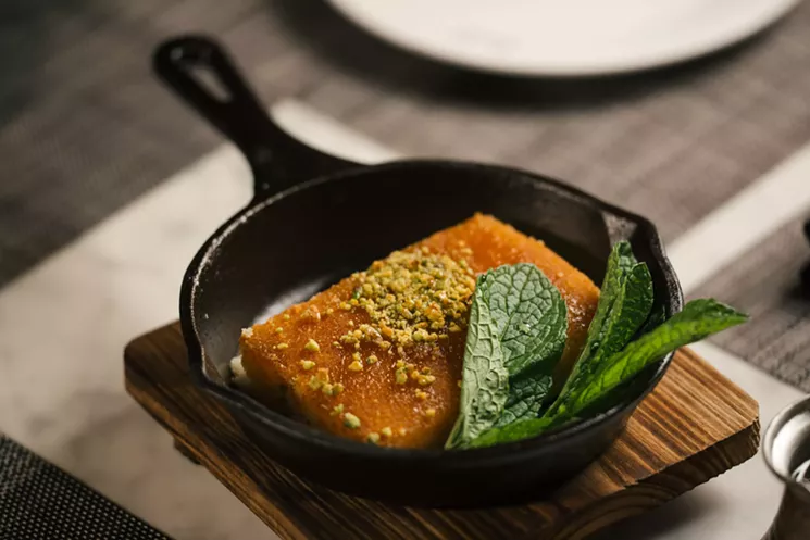 Knefeh, a traditional Middle Eastern dessert made with cheese and a sweet syrup poured over top. - KATHY TRAN