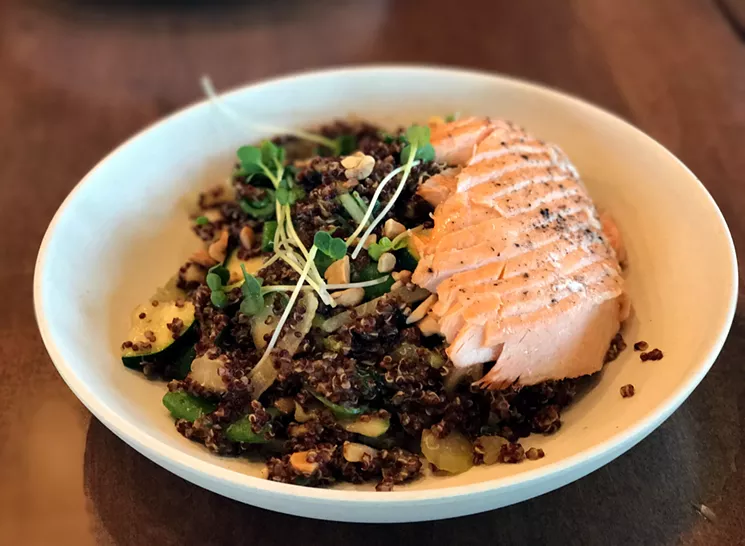The Thai cashew quinoa bowl with added salmon ($16), a fresh mix of zucchini, snap peas, onion, celery, quinoa, shiitake mushroom, jalapeño and Thai basil on a bed of red quinoa. - BETH RANKIN