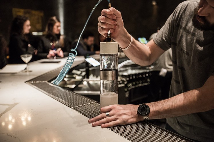 You won't spot much of the technology used at Hide, but you will occasionally witness bartenders using machines like this one, which injects the gin and tonic with high-grade carbon dioxide to carbonate the drink. - MELISSA HENNINGS