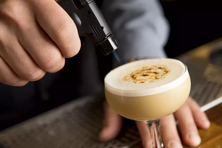 Flip Side — a cocktail made with bitters, Cardamaro Amaro, East India Solera Sherry, egg and grated cardamon - ALISON MCLEAN