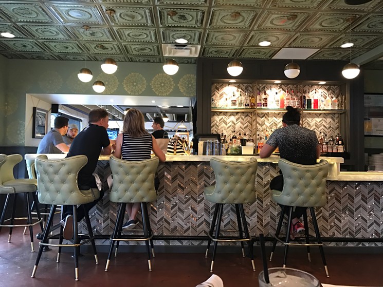 Stellar, a new bar and restaurant, boasts "mid-century modern décor," according to a press release, but the buildout is far too reliant on current design trends to fit that aesthetic. - BETH RANKIN