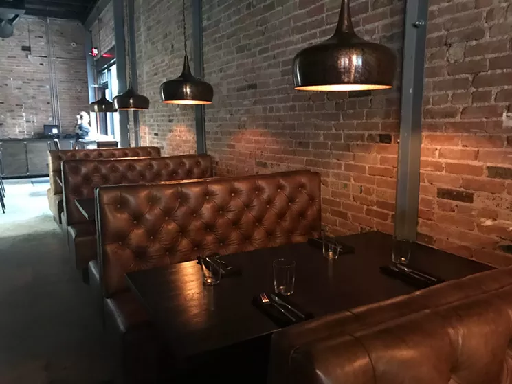 IdleRye has plenty of intimate booths for hiding from the frenetic energy of Deep Ellum. - BETH RANKIN