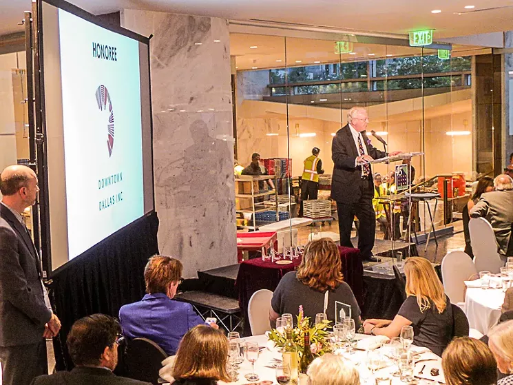 John Crawford, vice chairman of Downtown Dallas Inc., accepts an award for the organization's efforts in revitalizing the urban core of the city. - NICHOLAS BOSTICK
