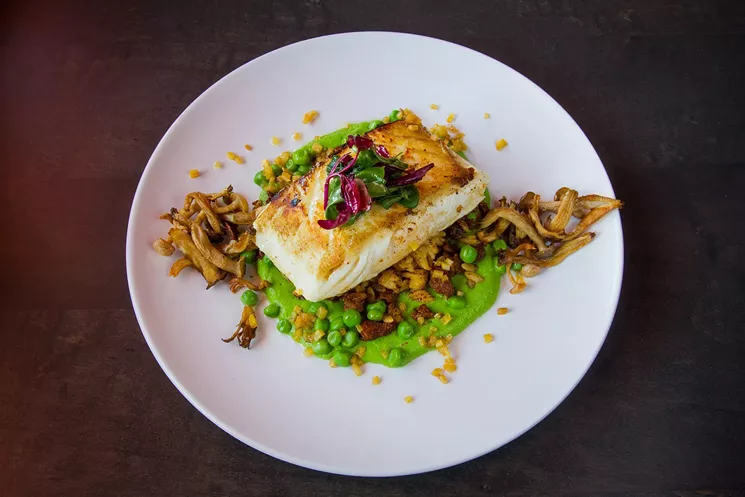 Café Salsera's new menu features halibut with chorizo and orzo pasta, sautéed wild mushroom, parsnips and a pea puree ($19). - COURTESY OF CAREY CHAN