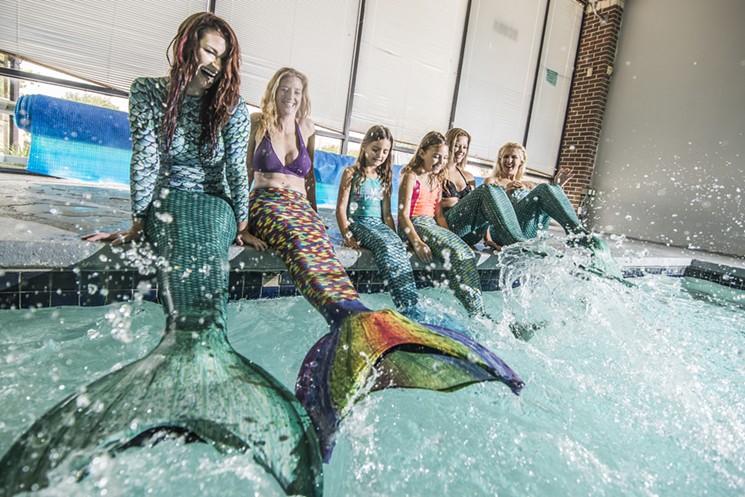 Moira Dobbs leads her mermaid class in splashing water with their tails. - CAN TURKYILMAZ