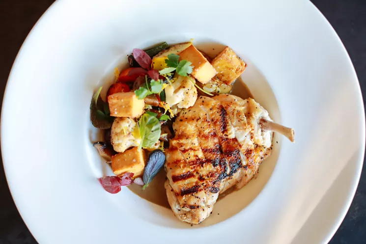 This may look like a simple chicken dish, but don't be fooled: This Mot Hai Ba treat is a savory flavor explosion. - KATHY TRAN