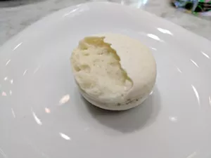 “The pastry chef won’t serve anything that’s not perfect,” the waitress explained, and then the pastry chef served our food critic this macaron. - BRIAN REINHART