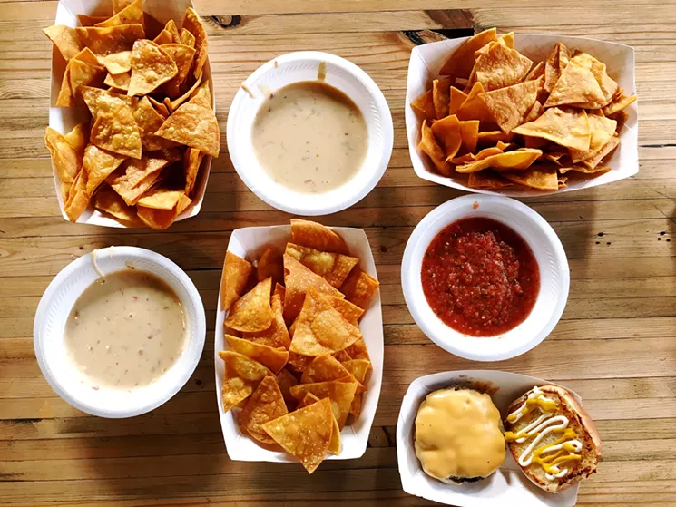 Our favorite dish at Coup D'etaco is the queso, served with fresh-fried tortilla chips. And the $4 burger is the perfect late-night bar snack. - COURTNEY JACOBS