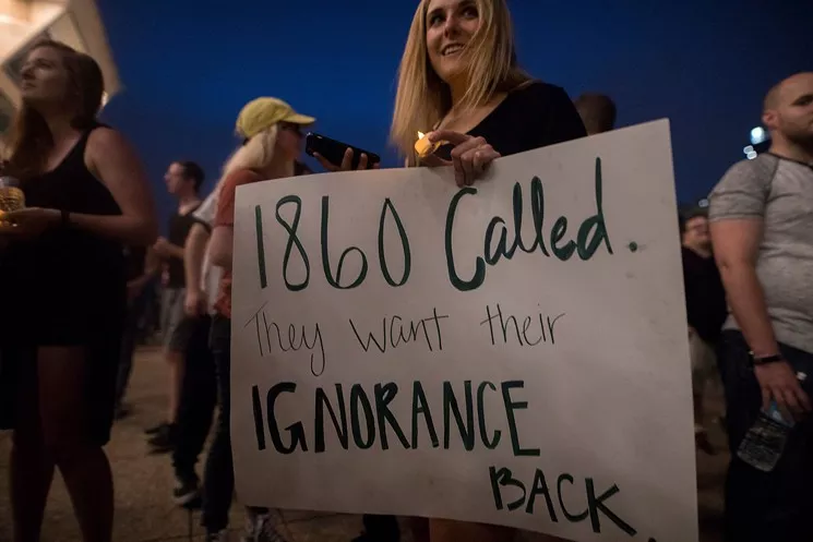 A protest at City Hall on Aug. 19 had a lot to do with a turn-around by city officials on the Confederate memorials issue. - BRIAN MASCHINO