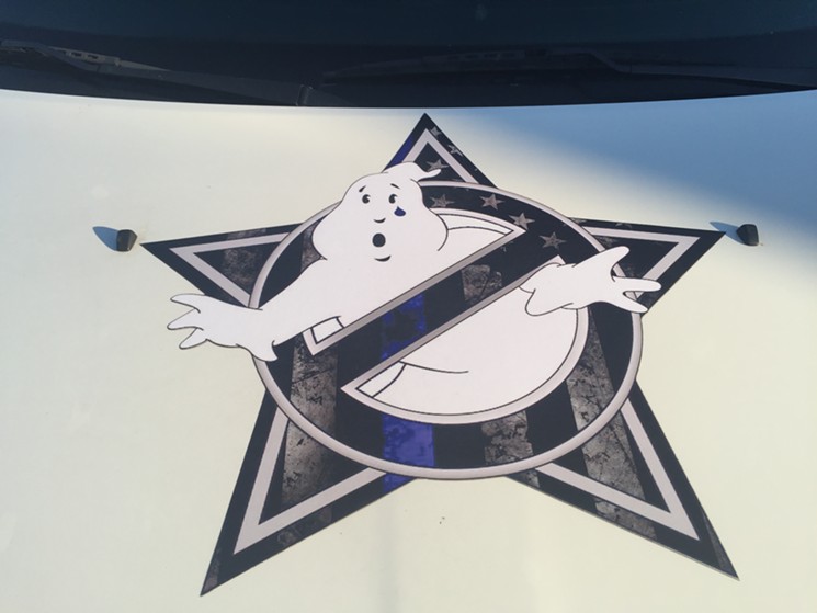 The DFW Ghostbusters group added a tear to the logo on the car's hood after the 2016 sniper attacks that took the lives of five police officers in Dallas. - PHOTO BY DANNY GALLAGHER