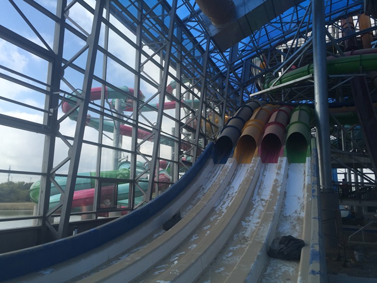 Up to four guests can race each other down this series of slide tubes that start at the top of the stairwell and twist around the entire structure before dropping toward the finish line. - DANNY GALLAGHER