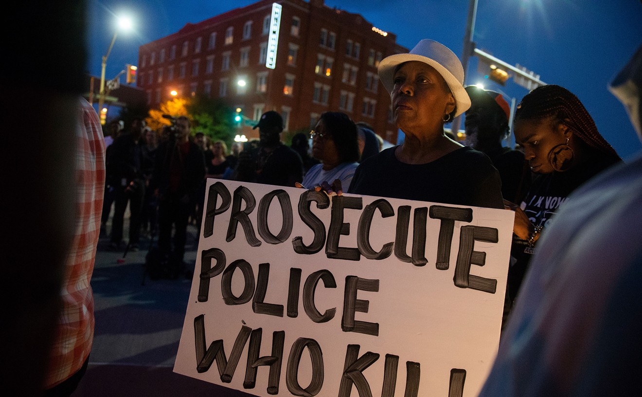 Demonstrators protest the death of Botham Shem Jean at Dallas police headquarters on Sept. 7.