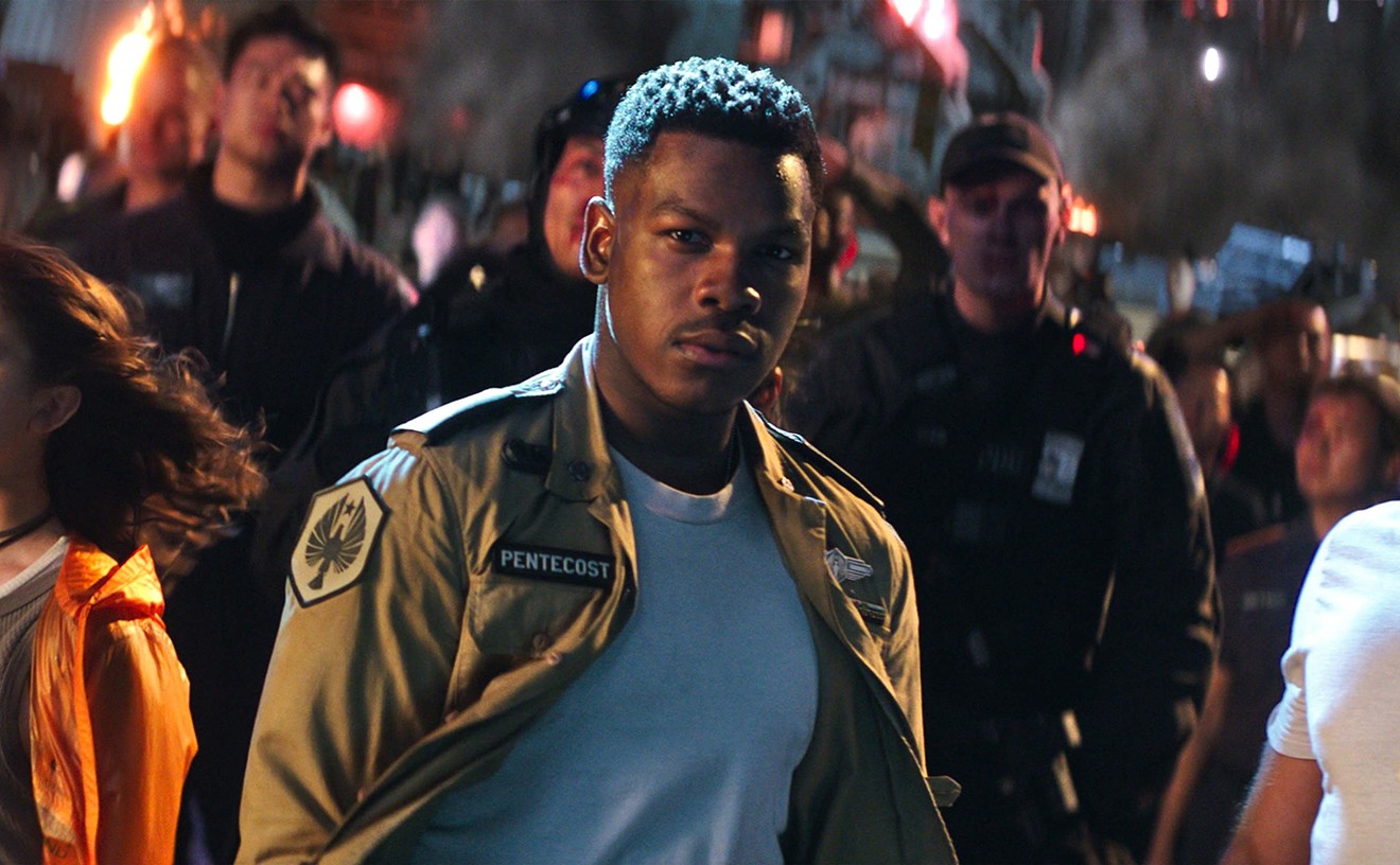 The cast of Pacific Rim Uprising includes (from left): Cailee Spaeny as Amara, John Boyega as Jake and Scott Eastwood as Nate.