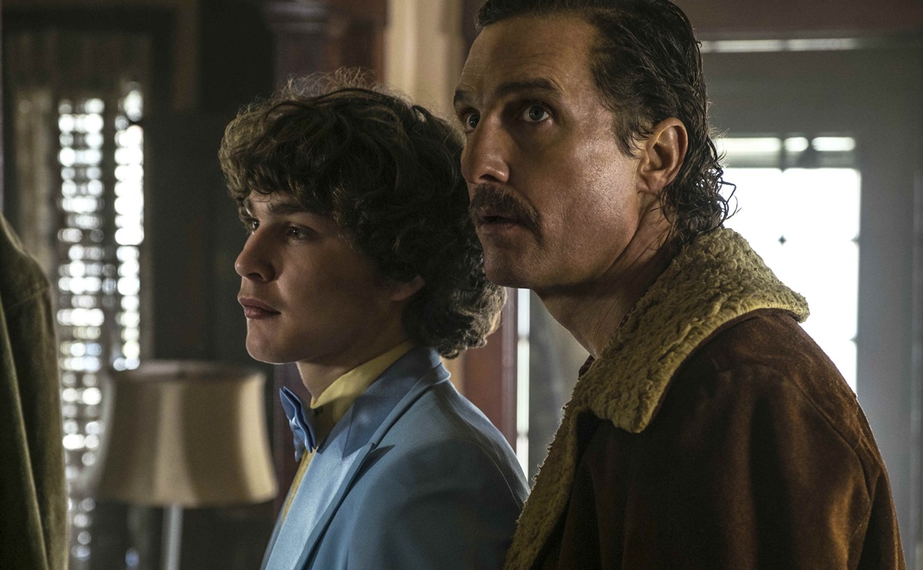 In White Boy Rick, Richie Merritt (left) portrays Richard “Rick” Wershe Jr., who, at age 14, became the youngest informant in the history of the FBI while his dad (played by Matthew McConaughey) sold guns from his trunk.