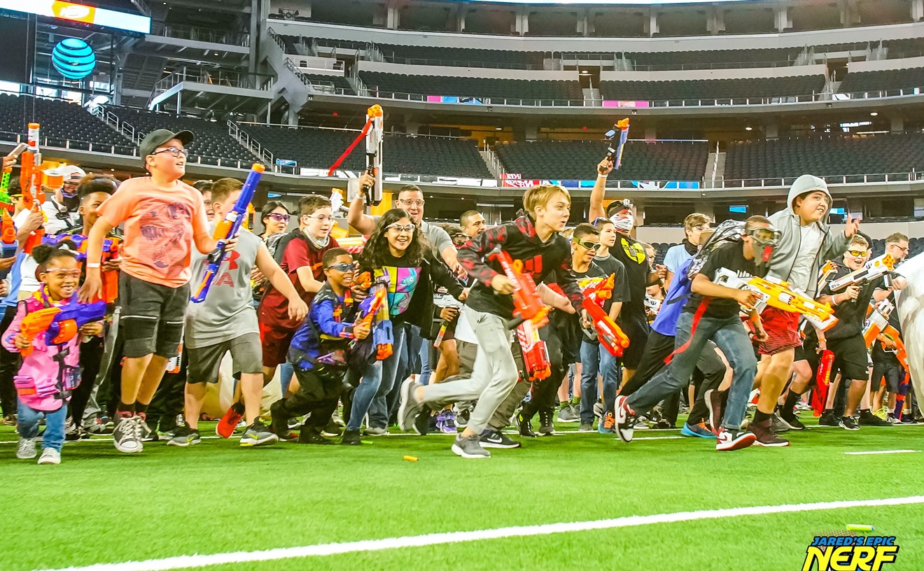 A group of kids take to the field of AT&T Stadium in 2019 with their foam dart guns in tow for Jared's Epic Nerf Battle 4, an event that's returning on Friday and Saturday with Jared's Epic Blaster Battle 5 and 6.