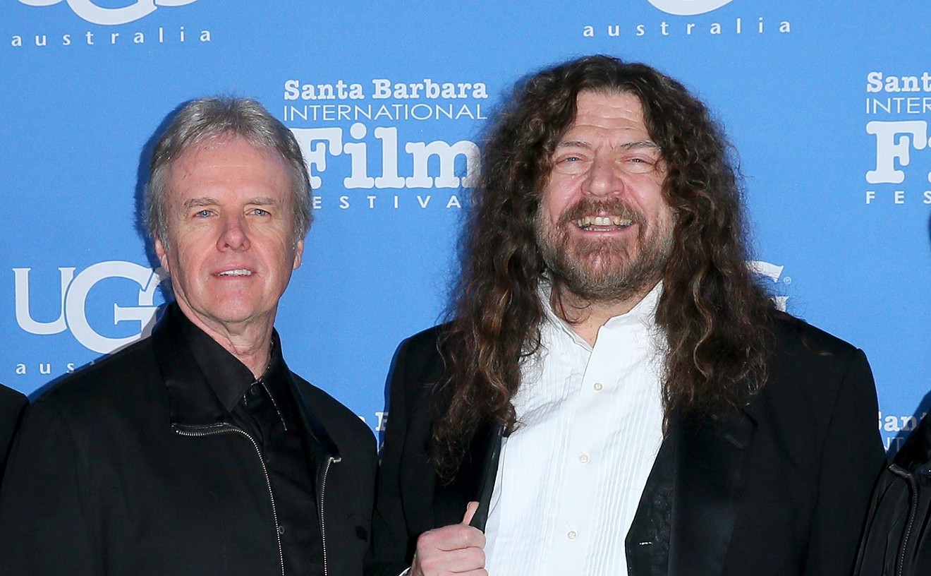 From left: Kansas manager Budd Carr, drummer Phil Ehart and violinist Robby Steinhardt with Charley Randazzo posing at the Montecito Award honoring Jennifer Aniston in 2015.