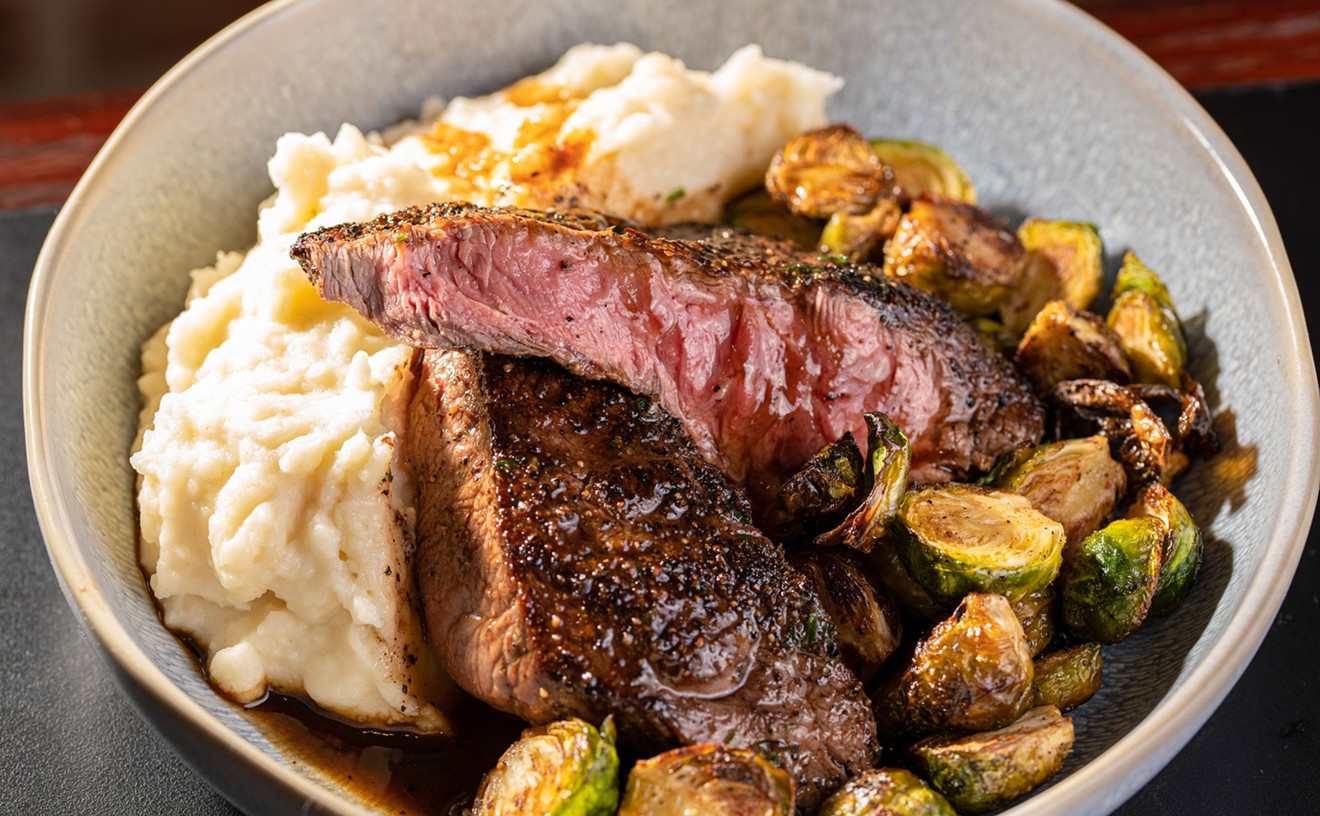Pepper crusted flat iron steak with compound butter, whipped potatoes, brussel sprouts