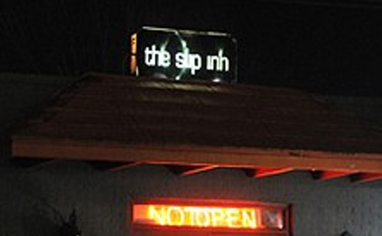 Best Night Club Attached to a Convenience Store 2005 The Slip Inn Best of Dallas® 2020 Best Restaurants, Bars, Clubs, Music and Stores in Dallas Dallas Observer image