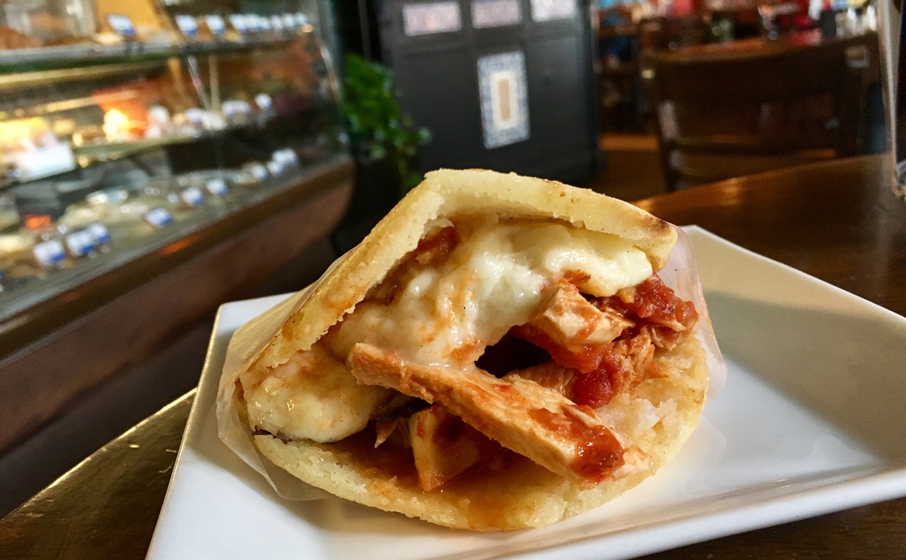 Zaguán's chicken and cheese arepa — a savory corn turnover like a gordita — is $7.95.