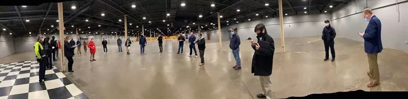 Dallas County officials along with Health and Human Services Director Dr. Philip Huang scout the new vaccine center at Fair Park last week.