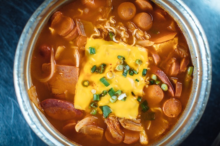 Treat your lady to some Korean soup made with hot dogs and American cheese at Ddong Ggo.