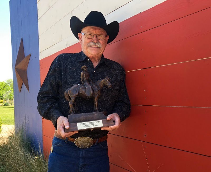 Actor Barry Corbin, at his home in Handley, holds the award he received for his induction into the Hall of Great Western Performers at the National Cowboy & Western Heritage Museum in Oklahoma City.