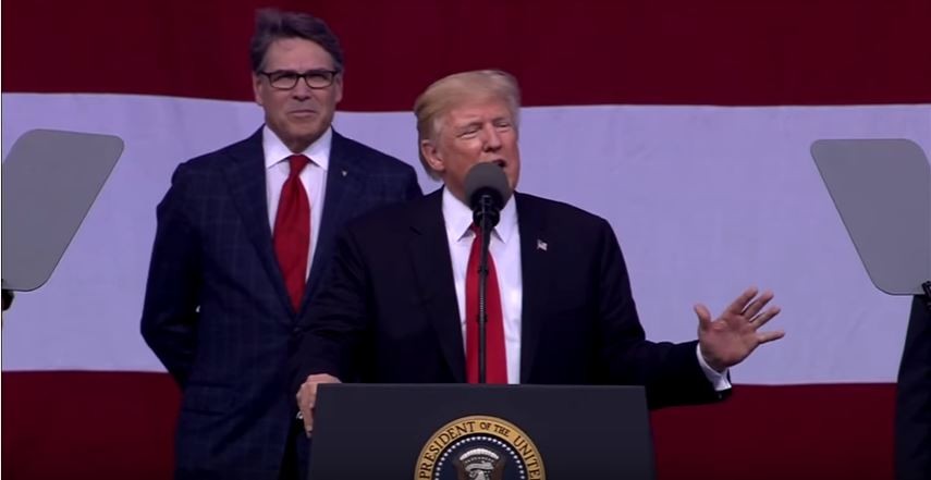 Donald Trump, flanked by Rick Perry, addresses the Boy Scouts' annual jamboree in 2017.