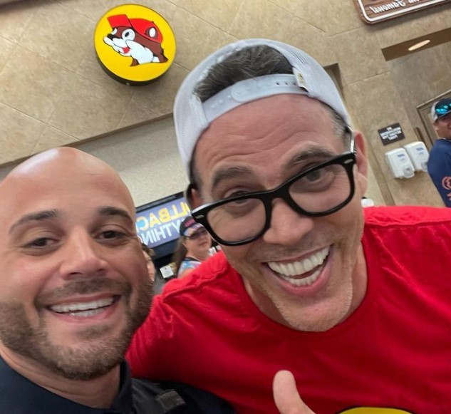 Sugar Land Police Sgt. Justin Pannell, left, took a selfie with Jackass star and stand-up comedian Steve-O, right, at a Buc-ee's location in Wharton.