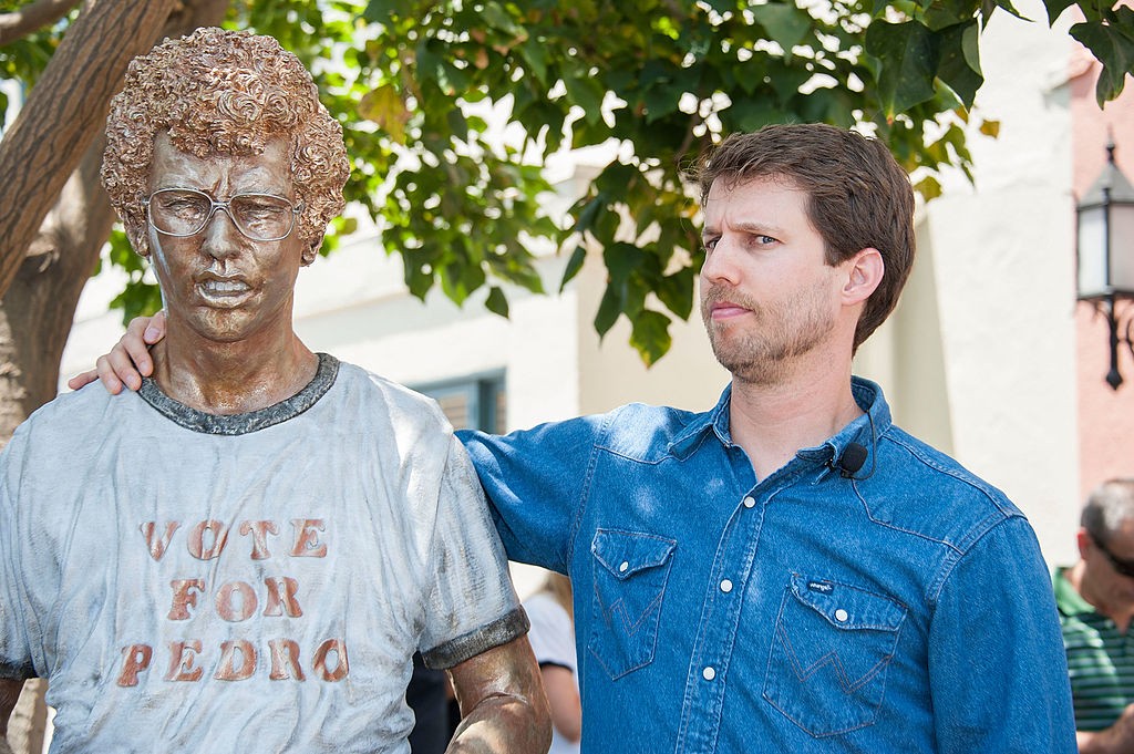 Actor Jon Heder with a statue of his character from Napoleon Dynamite at the Fox Studio lot in 2014.