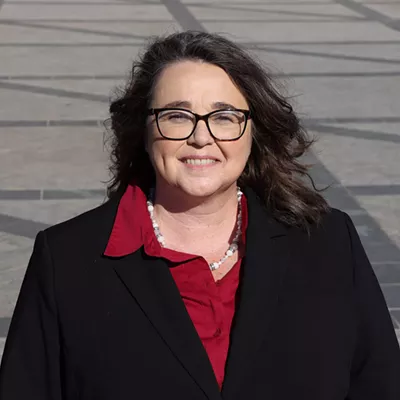 Dr. Lora Burnett says she was terminated from Collin College after she criticized then-Vice President Mike Pence on social media.